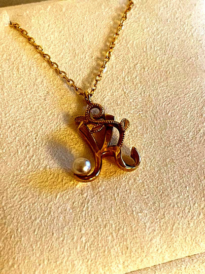 MIKIMOTO K18 necklace featuring a single pearl on a delicate gold chain