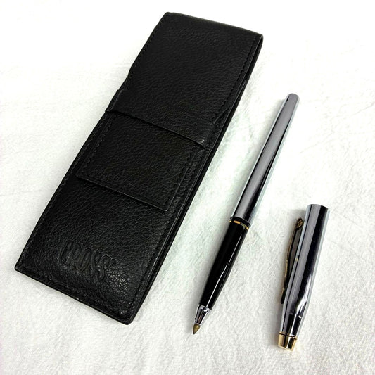 Silver CROSS ballpoint pen with dedicated case and replacement ink on a white background