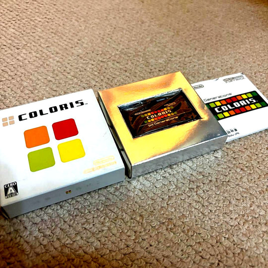 Game Boy Advance bit Generations COLORIS software cartridge with manual and case showing some scratches and stains