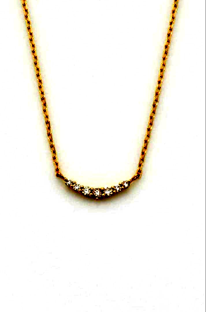 Nika K10 gold necklace with diamond pendant and spring ring clasp on a white background