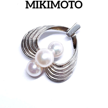 Mikimoto silver pearl necklace pendant top with 6.2-6.9mm round pearls on a white background