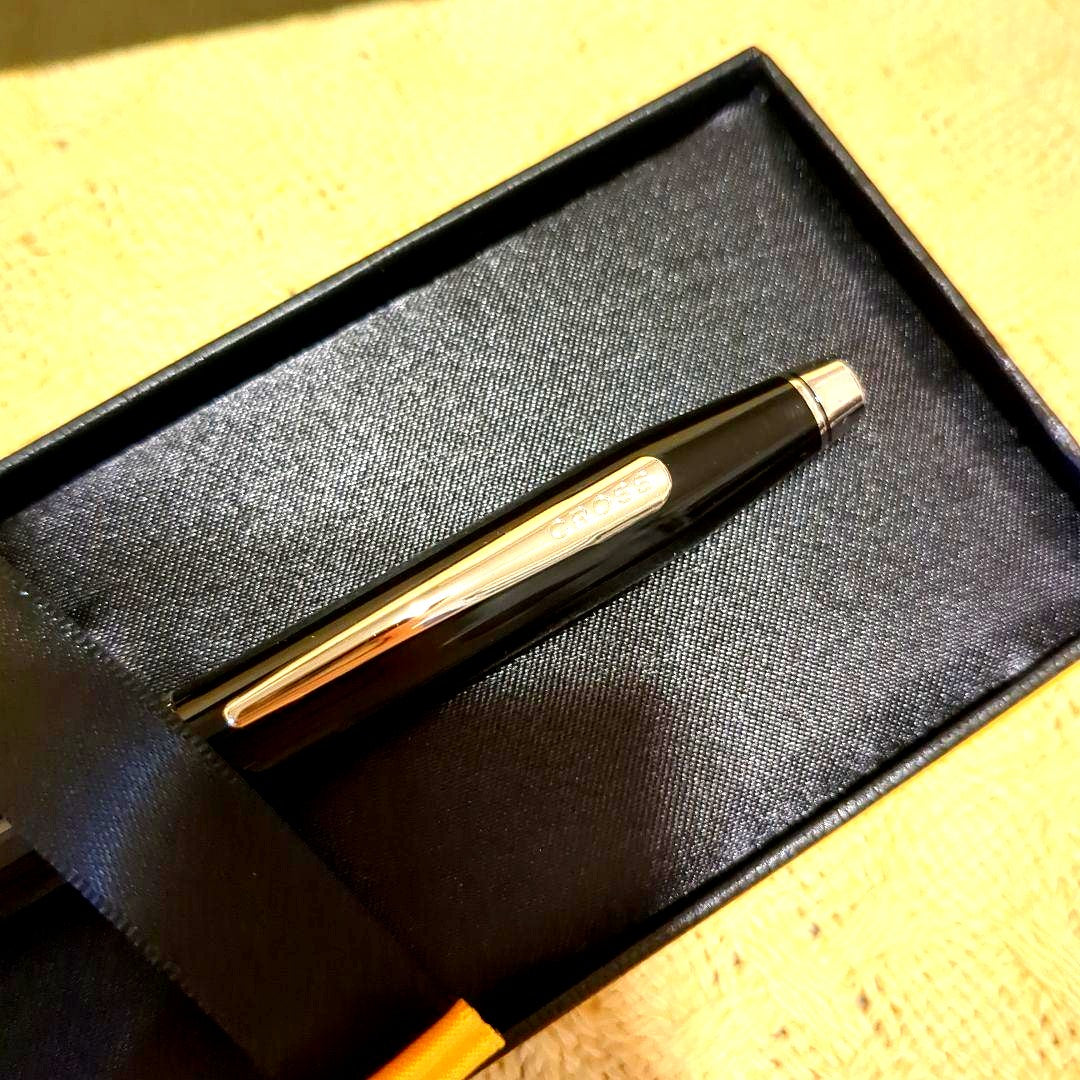 CROSS black metal ballpoint pen with slim design displayed next to a black gift box
