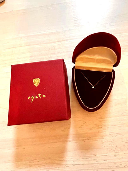 Agete K18 gold necklace with diamond pendant on a white background showing 40 cm length
