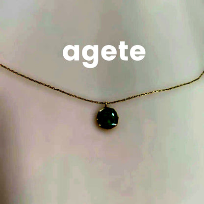 Agete octagonal gold necklace featuring a green octagonal stone pendant on a delicate chain