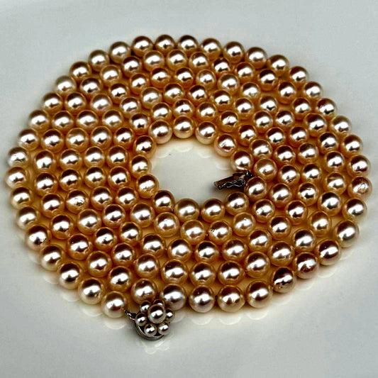 Tasaki 130cm long Akoya pearl necklace with lustrous 7.5-8.0mm white pearls