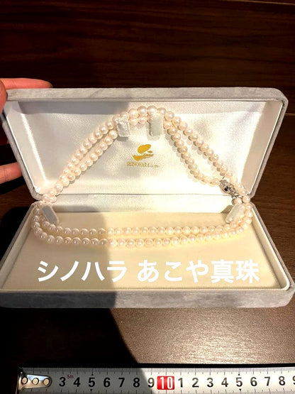 Takayama Akoya pearl necklace with 5mm white pearls and silver clasp displayed with a dedicated case