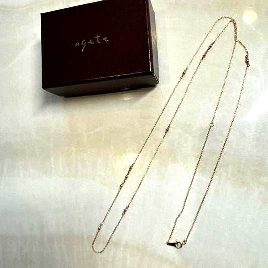Agete 10k gold chain necklace 80cm length displayed on white background