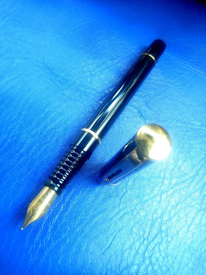 Black WATERMAN fountain pen with sleek design shown on neutral background