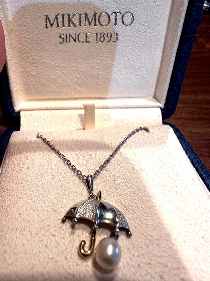 MIKIMOTO umbrella motif pearl necklace made of silver and K18 with pearls, displayed with included case