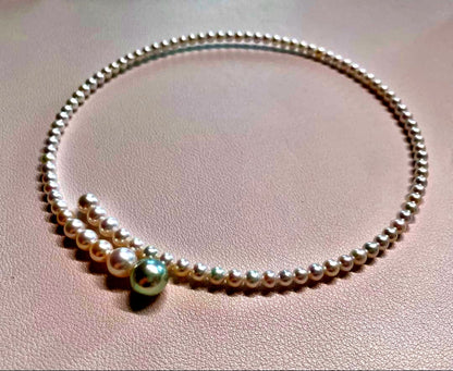 Multicolor Akoya pearl necklace with 4.0-9.3 mm pearls in omega style choker design