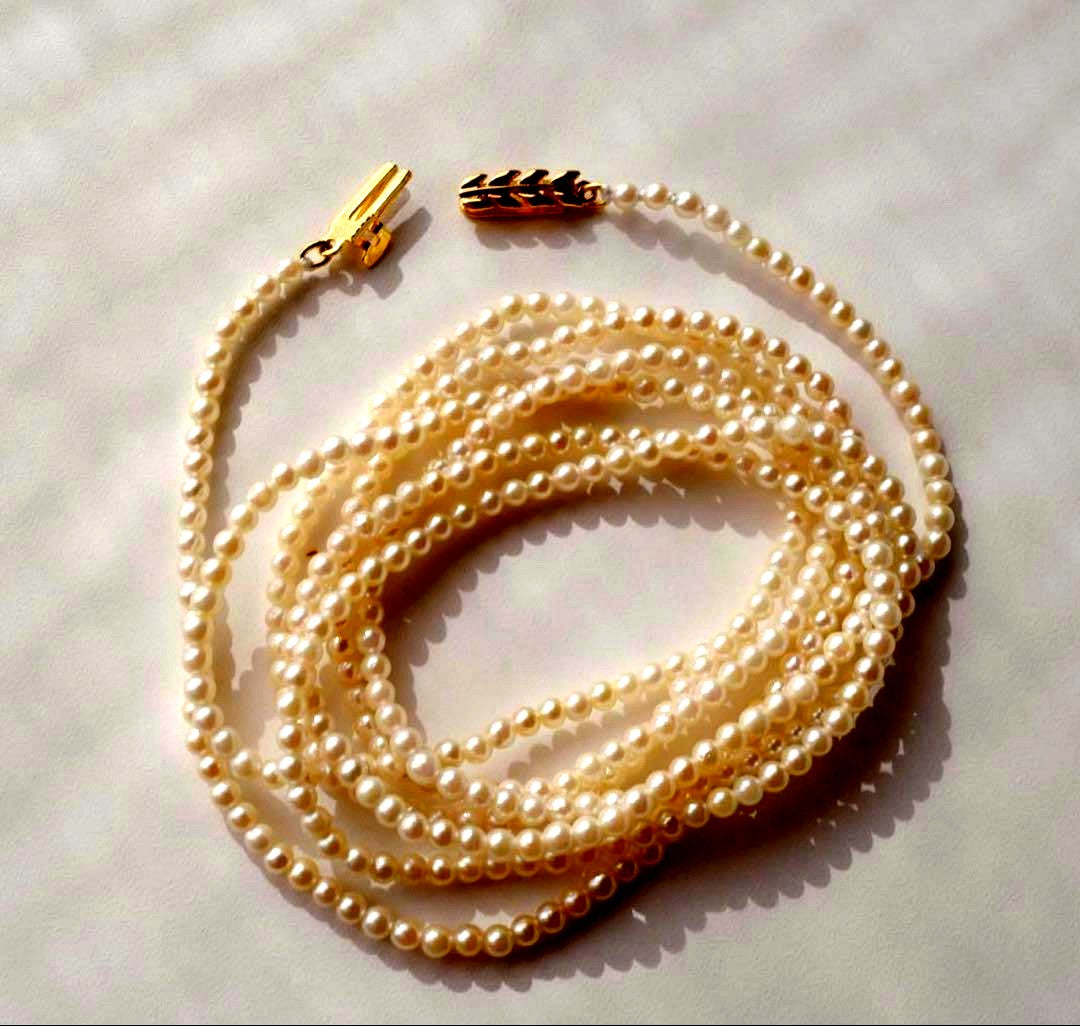 Freshwater Akoya baby pearl necklace 112cm long with small ivory tone pearls and gold plated fittings