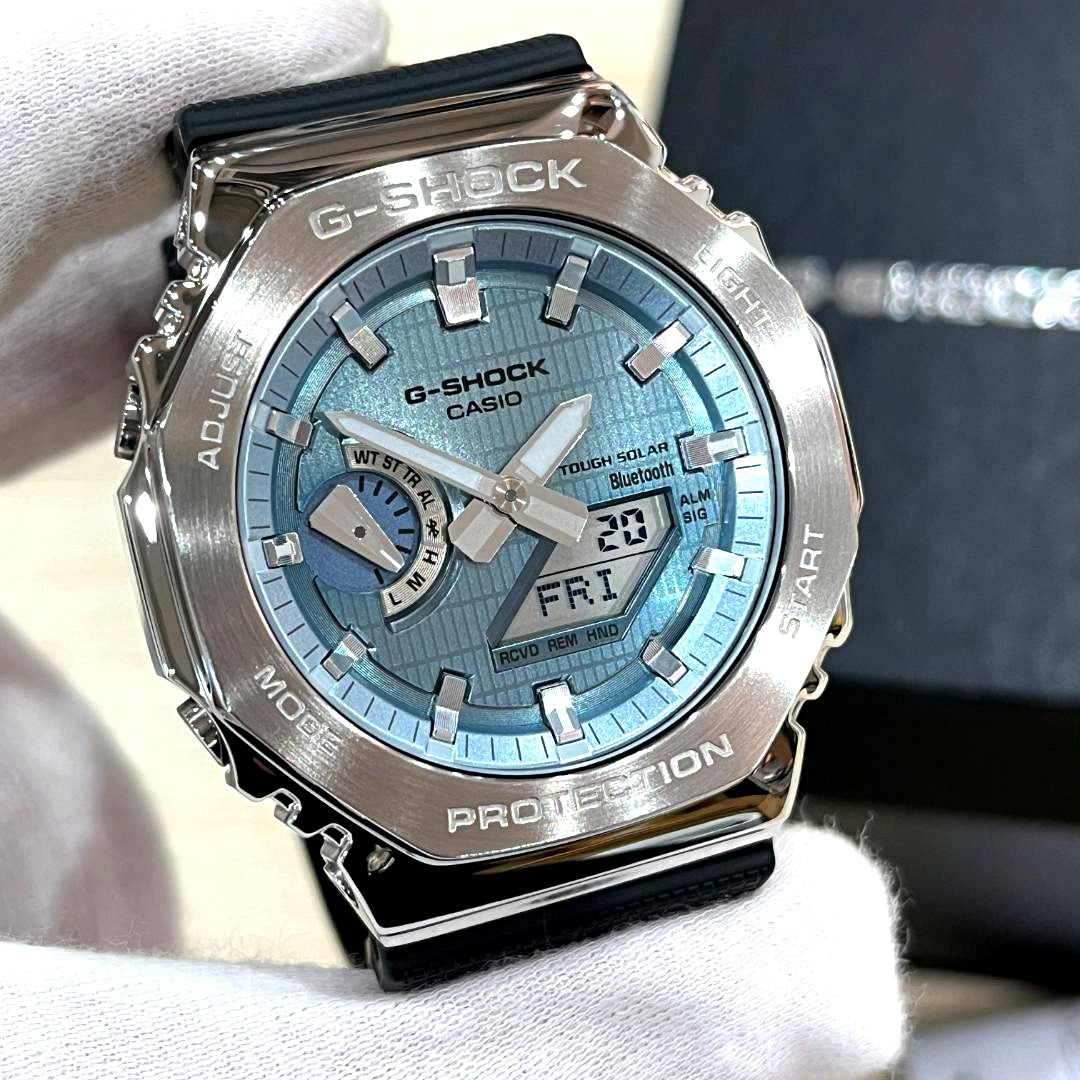 Casio G-Shock GBM-2100A-1A2JF analogue digital watch with stainless steel bezel and light blue dial