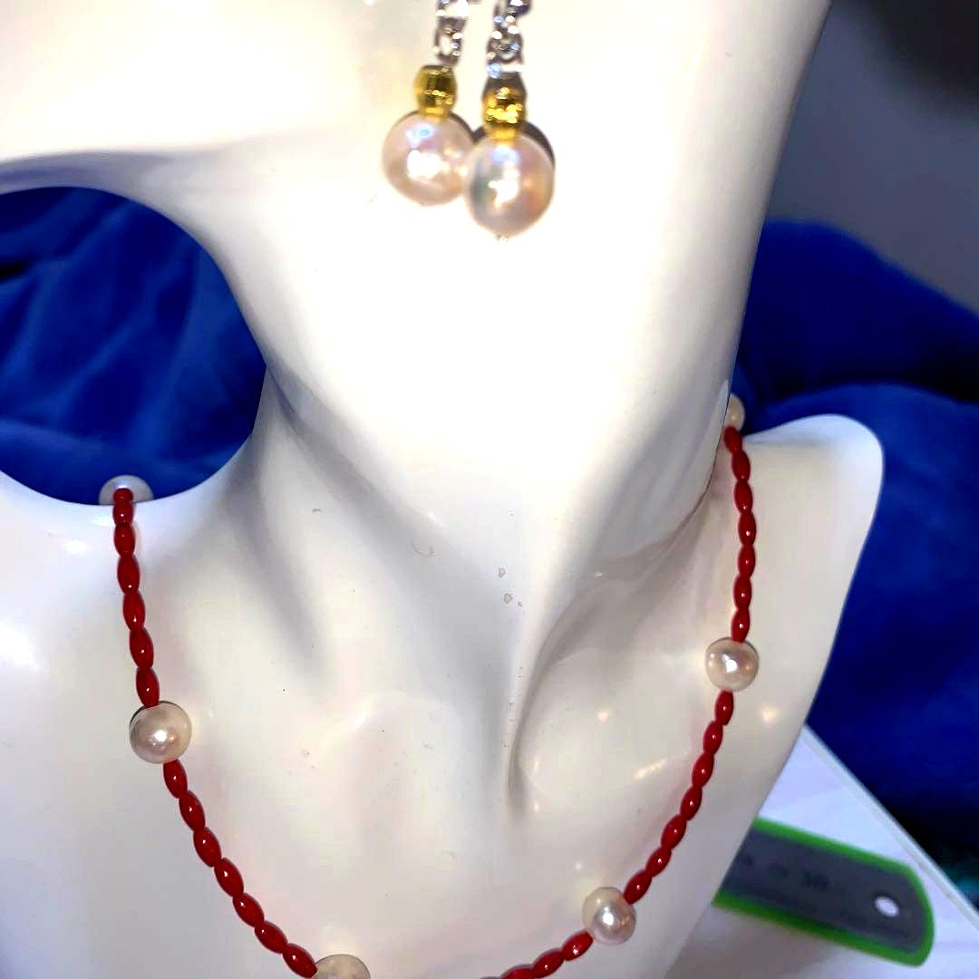 Blood-red coral necklace and matching earrings with 9.5mm Akoya pearls on 48cm chain