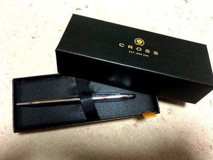Cross black ballpoint pen with company logo, black ink, unopened box and instruction manual