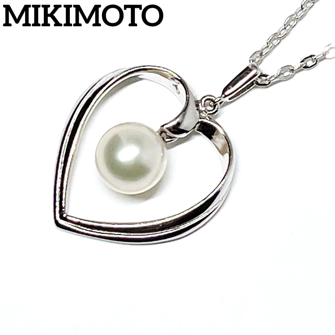 Mikimoto pearl necklace with heart motif featuring 7.1mm pearls on silver chain at 40cm length
