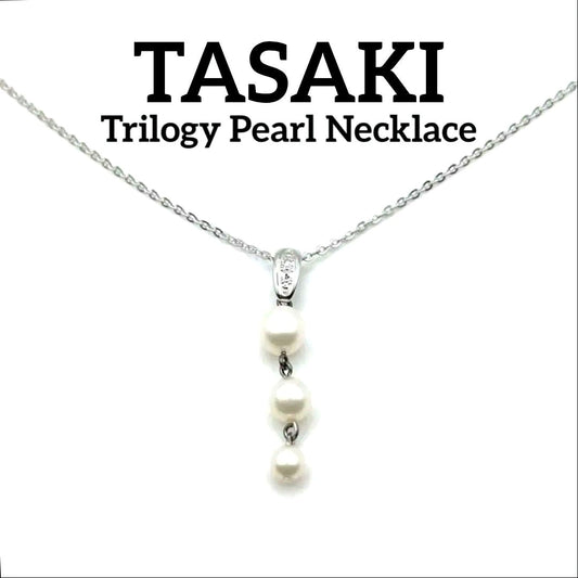 Tasaki Trilogy Necklace in Silver 925 with three white pearls of varying sizes on silver chain