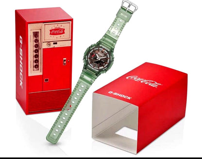 Casio G-Shock Coca-Cola Edition GA-2100CC-3AJR green watch with Coca-Cola bottle motifs and special collaboration packaging
