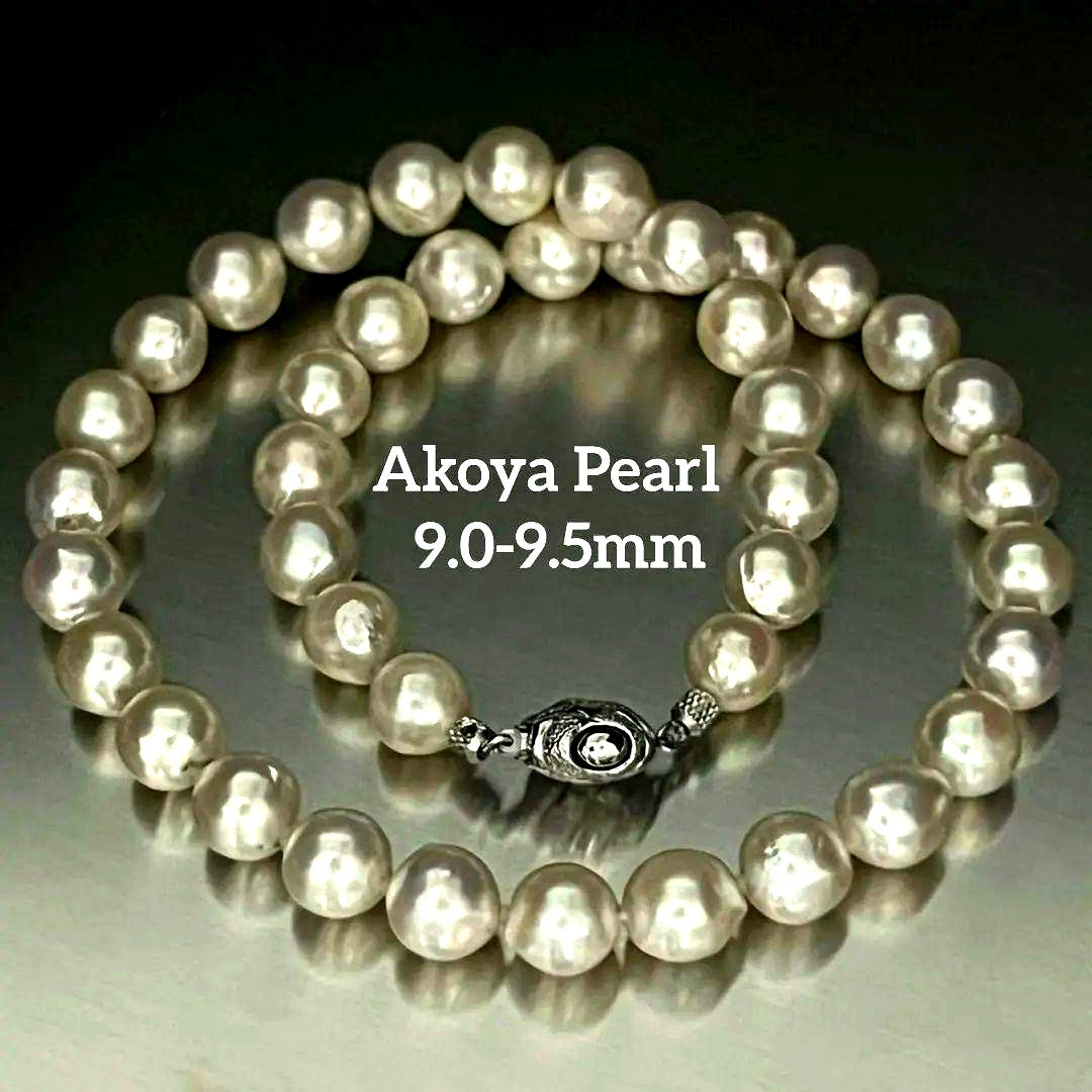 Akoya pearl necklace with 9.0-9.5mm white semi-round pearls and silver engraved round clasp, 42cm length