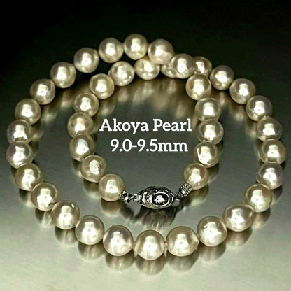 Akoya pearl necklace with 9.0-9.5mm white semi-round pearls and silver engraved round clasp, 42cm length