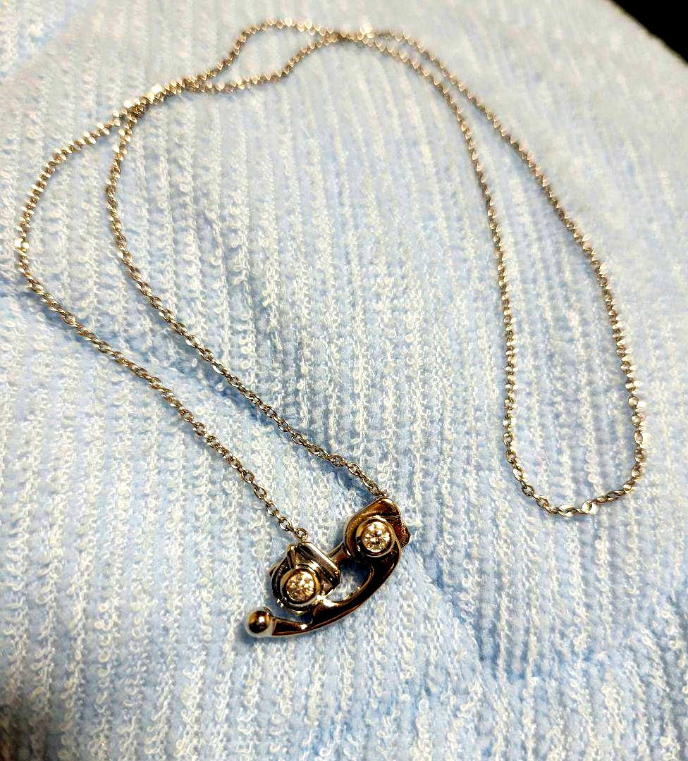 Tasaki diamond necklace featuring 0.15ct diamonds set in K18WG metal weighing 6.1g