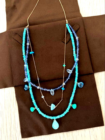 Agete 3-row necklace with turquoise, larimar, blue topaz, tanzanite, and quartz stones in blue tones on K10 gold