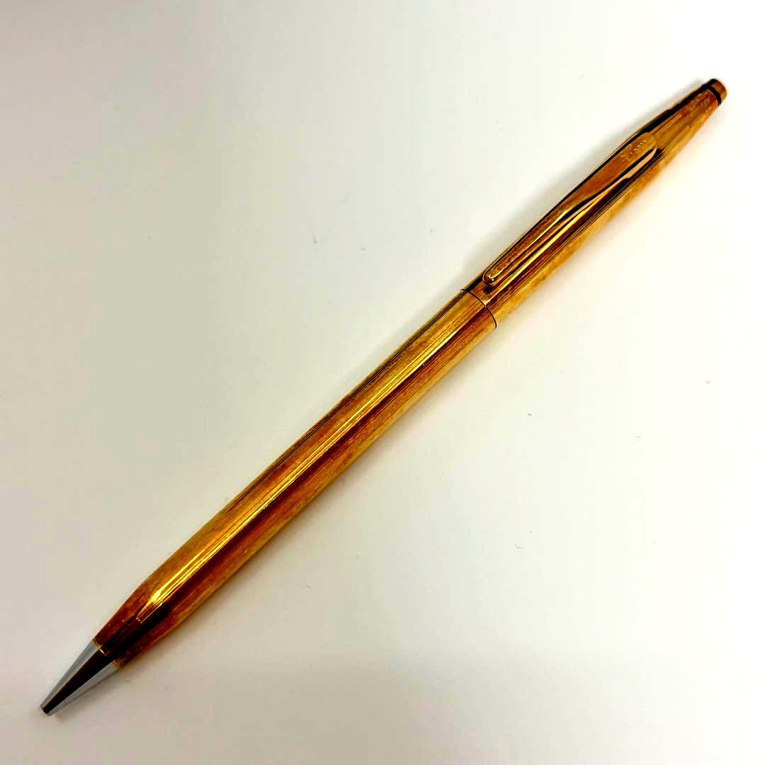 Seiko Century Cross mechanical pencil made of 18 karat gold, showing vintage wear