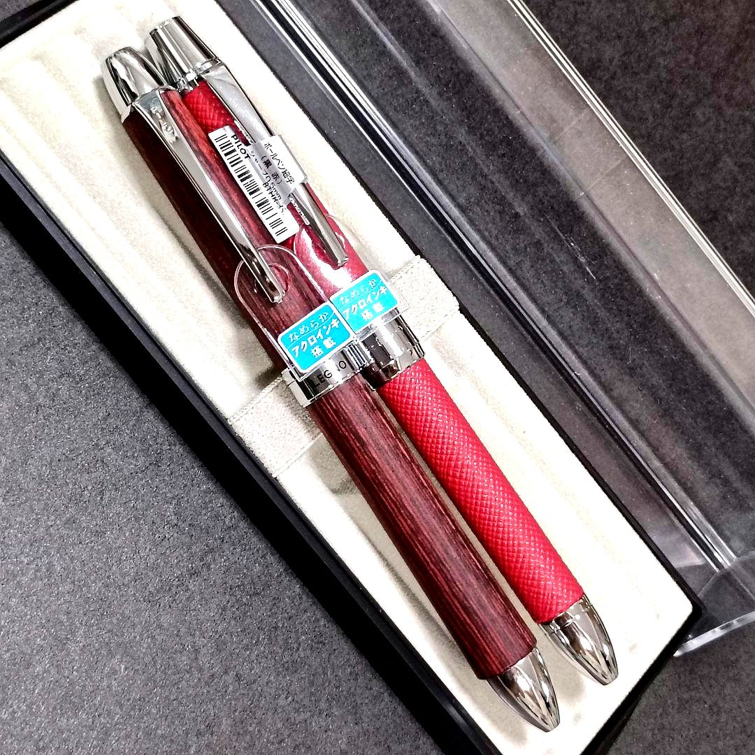 PILOT multi-function pen set with leather style and wooden barrel pens displayed on white background