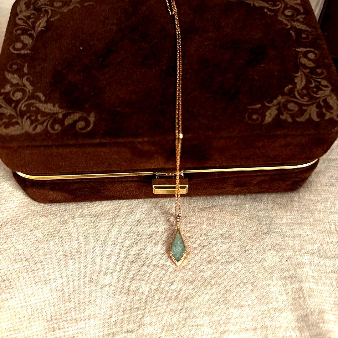 Agate K10 necklace charm with Amber, Turquoise, Larimar stones and shell detail on a silver chain