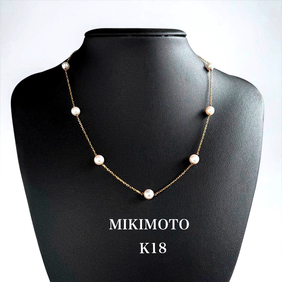 Kuro Pearl Station Necklace featuring nine round pearls with K18 clasp on a 37.5 cm chain