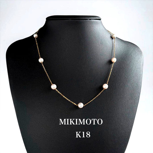 Kuro Pearl Station Necklace featuring nine round pearls with K18 clasp on a 37.5 cm chain