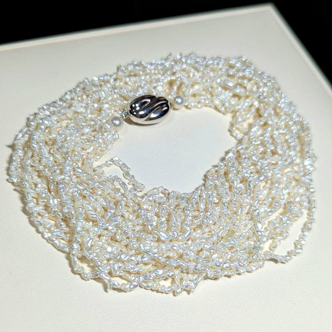 N97 Sorting Akoya pearls 10-string Kesshi necklace with 2-4 mm pearls, 48.5 cm length, displayed on white background