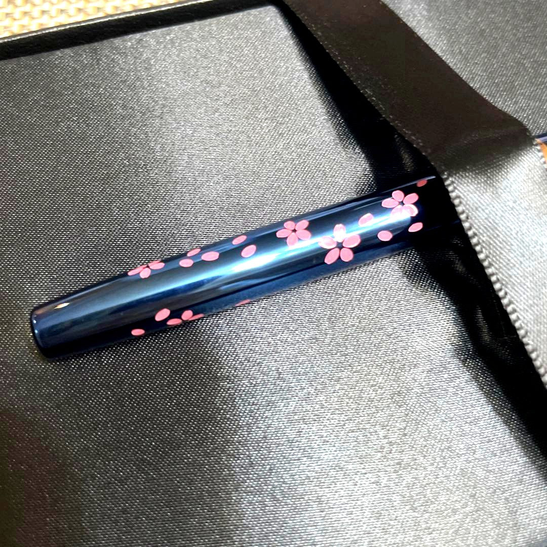 Unused Momo Mayu Cherry Blossom Pattern Cross Cap Pen with pink floral design