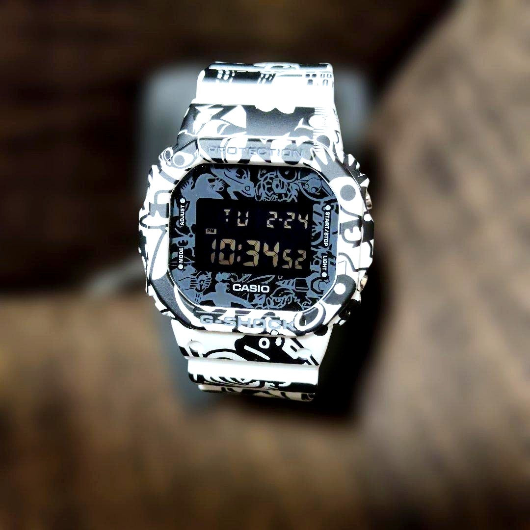 Casio G-Shock DW-5600GU-7JR watch with white and black graphic print, shock resistant, Japan import