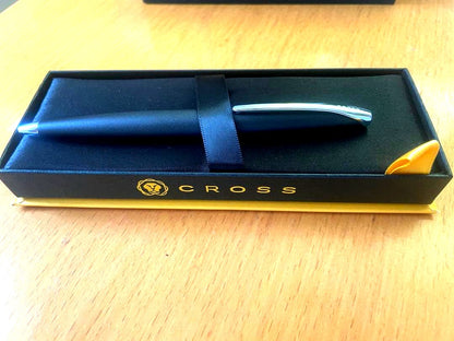 Cross brand ballpoint pen in matte black with silver accents and genuine case, new and unused