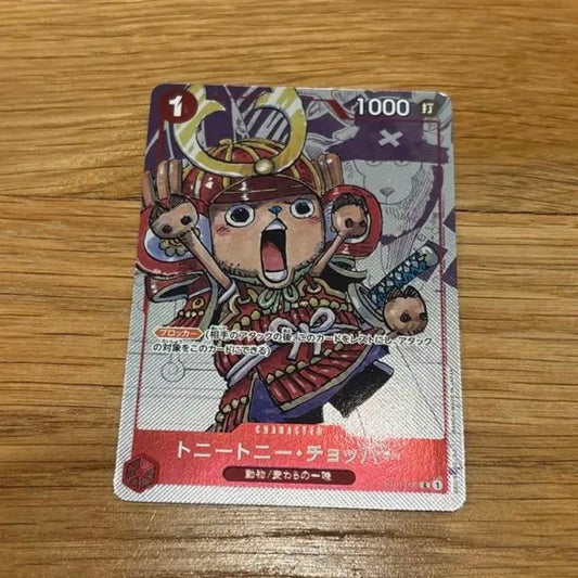 One Piece Card Game Toni Toni Chopper collectible card with 1000 points showing some white scratches