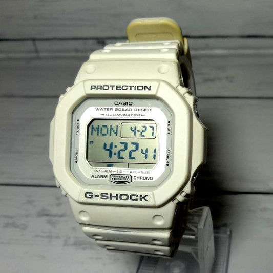 Casio G-Shock DW-5600P white square shock resistant watch with digital display and white strap