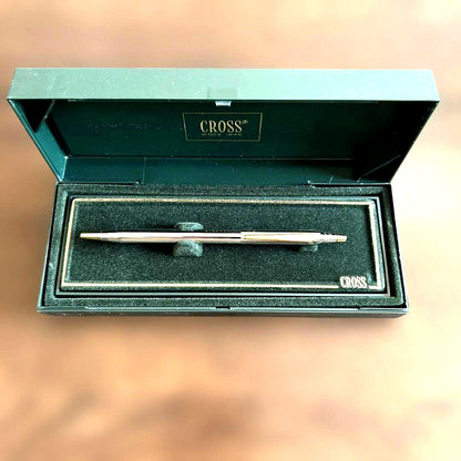 Cross silver ballpoint pen displayed with its exclusive dedicated case on a white background