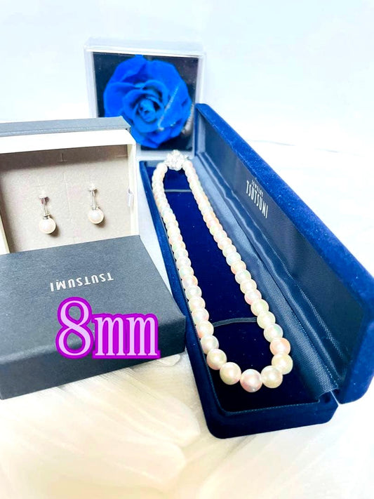 Tsutsumi Aurora Akoya pearl necklace and matching earrings with 8mm round pink-green pearls and silver clasps