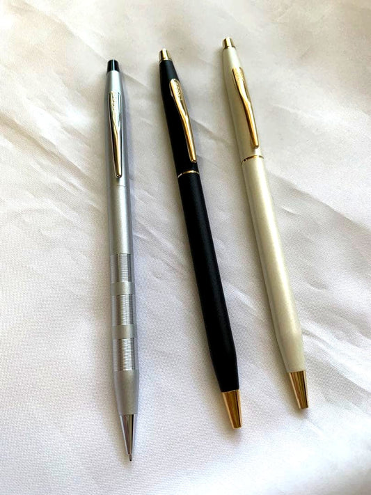 CROSS ballpoint pen set with two pens in black and white and one silver mechanical pencil