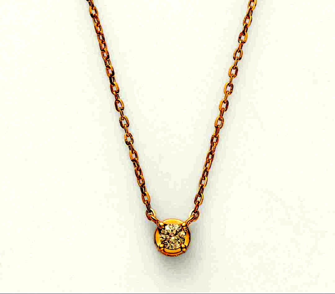 Agete Necklace made of 10 karat gold weighing 0.03 grams showcasing delicate design