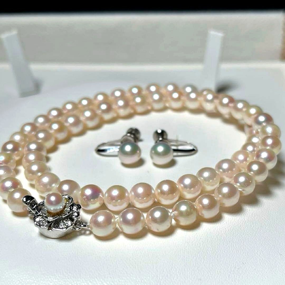 Akoya pearl necklace and earrings set with round 6.0-6.5mm pearls on silver material