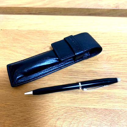 Cross black ballpoint pen with matching pen case featuring two compartments for two pens