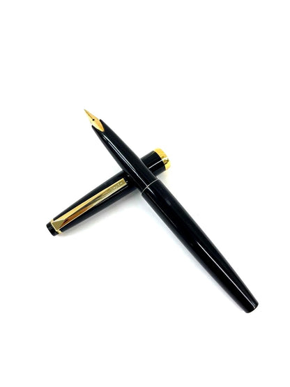 PILOT SUPER QUALITY fountain pen with fine nib, black body, and gold decorative elements