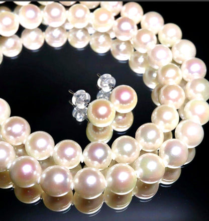 Akoya pearl necklace and earring set featuring 8.5-8.0mm white round pearls with silver fittings