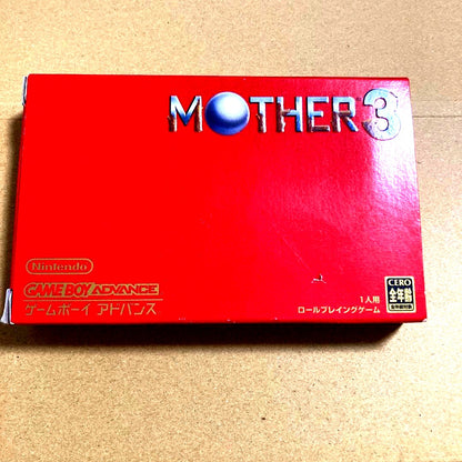 MOTHER3 Game Boy Advance game cartridge with label showing artwork and title