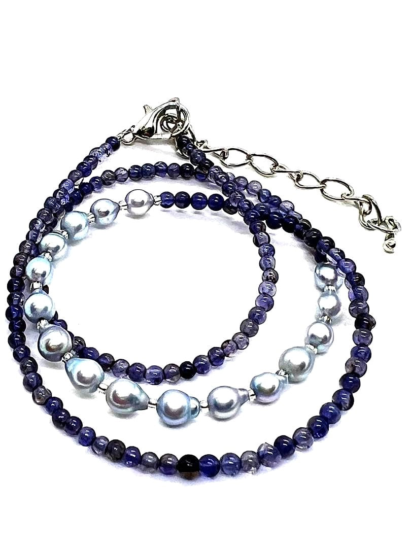 Akoya pearl necklace featuring natural blue baby pearls and small iolite stones on a 41 to 46 cm chain