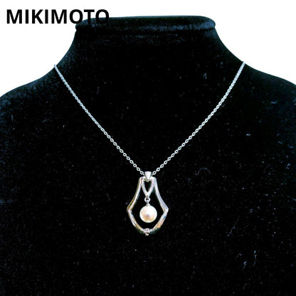 MIKIMOTO pearl necklace featuring a single 7mm pearl pendant with silver marking on 40.5cm chain