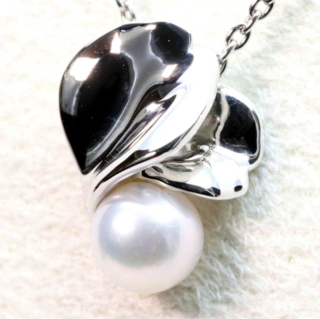 Mikimoto Silver Vendome Petal Necklace featuring a single pearl on silver petals, displayed on white background