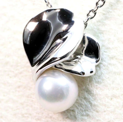 Mikimoto Silver Vendome Petal Necklace featuring a single pearl on silver petals, displayed on white background