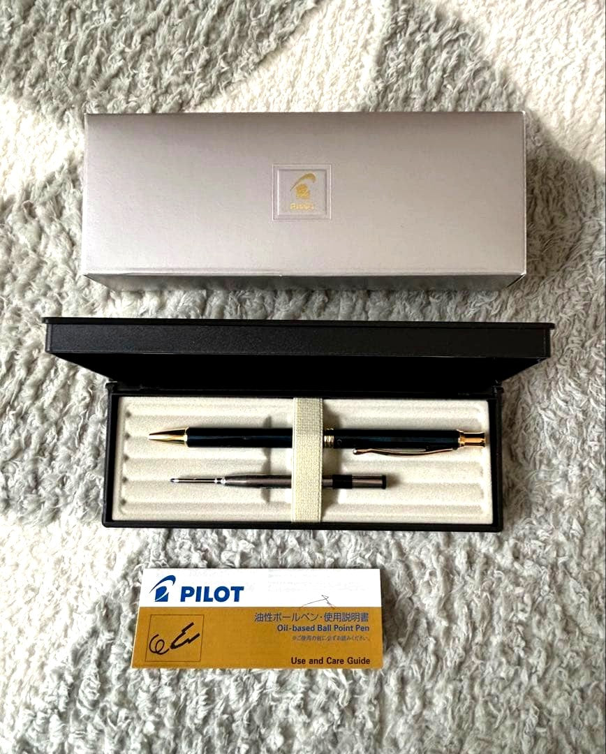 PILOT ballpoint pen set with black ink in deep green body displayed with gift box